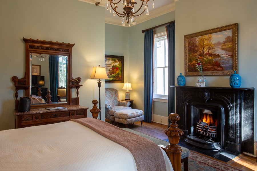 Working fireplace and reading nook in the Juliette Low Room
